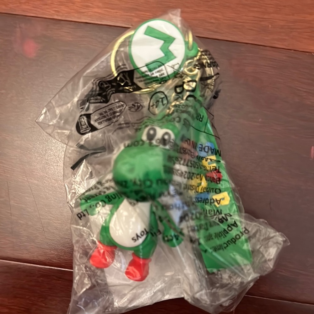 Green and White Character Keychain